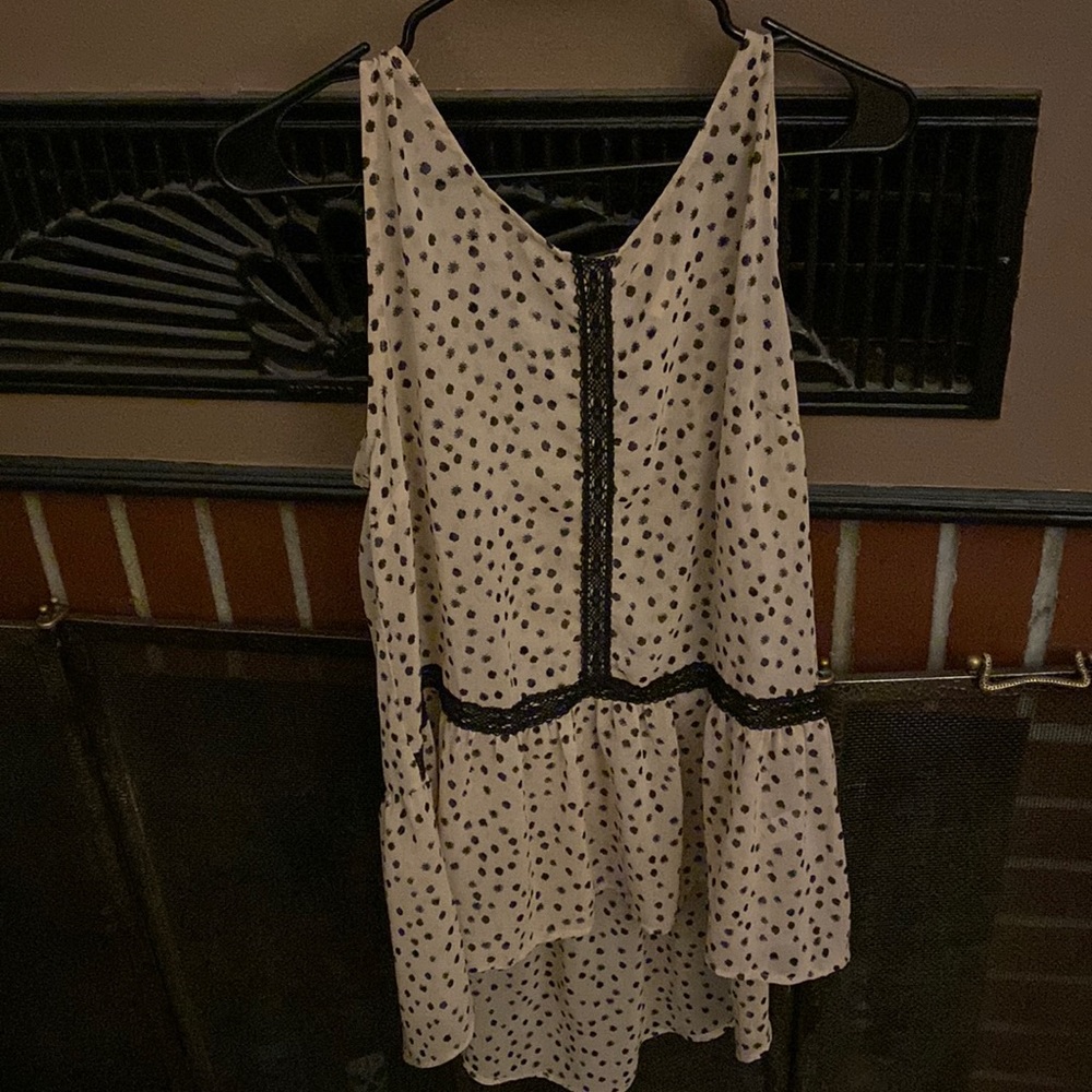 This is a Large “Stitch & Stitch” top
